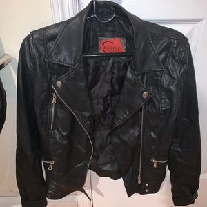 Black leather jacket .